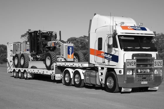 Onsite-GRADER-ON-TRUCK-bw-logo-web